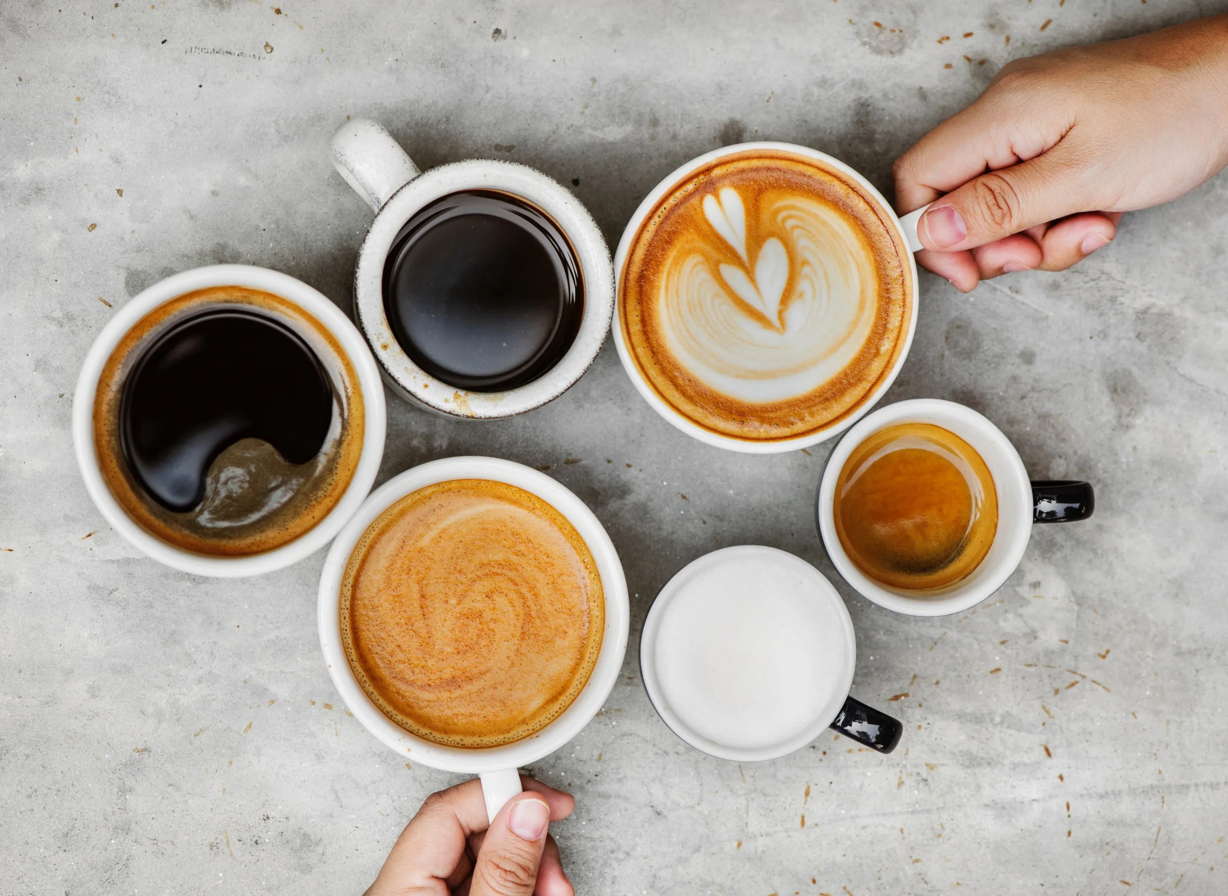 imageye___-_imgi_149_2664758-six-coffee-cups-table